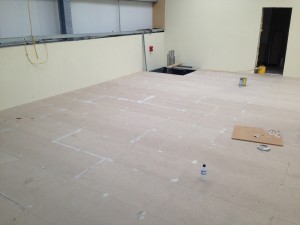 Beginning of floor filling to hide small gaps and screw holes