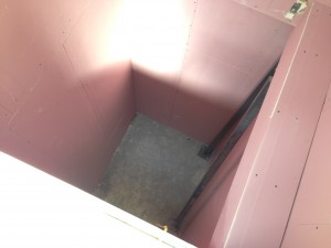 A look down the lift shaft with completed fire-rated enclosure