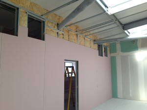 Enclosure insulation reaching ceiling