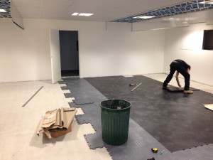 The flooring colour scheme aids with visualising the layout of the data hall ahead of total pod population