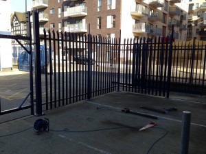 A corner of the fencing assembly reaching completion