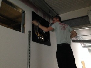 The second stack's intake fan being installed into the cold corridor enclosure