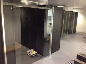 Custom cold corridor doors being fitted