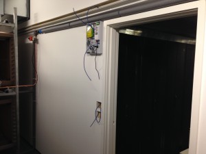 Cold corridor access control being installed