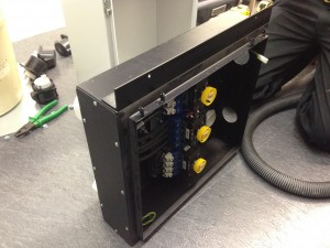 APC maintenance bypass switch for UPS being fitted with custom fabricated rack ears