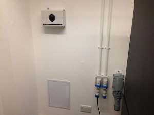Conduit run into top of outlets ahead of commissioning