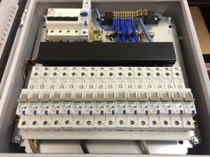 A look at the upper internals of the distribution panels with termination completed, with just the connections to the sockets left to complete
