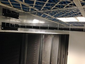 UPS cable bridging through cold aisle for first UPS run